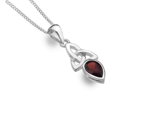 A silver chain with a knotted pendant with a dark red gem in it
