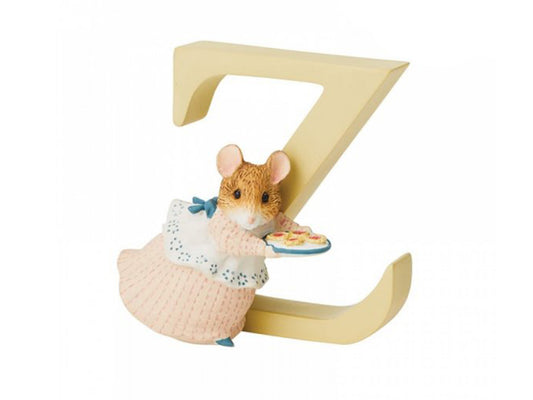 A pastel yellow letter Z with a small brown mouse wearing a red and white striped dress with a blue apron, carrying a plate of jam tarts.