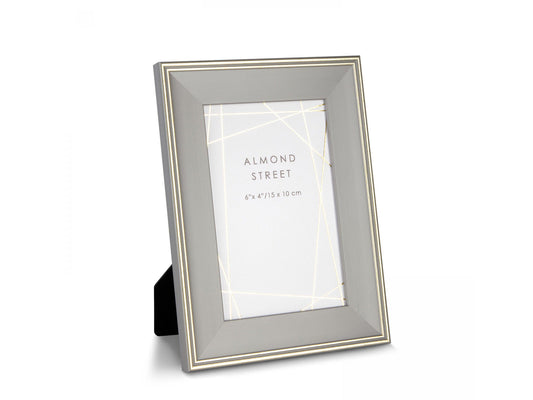 A smooth mid grey photo frame with gold edging