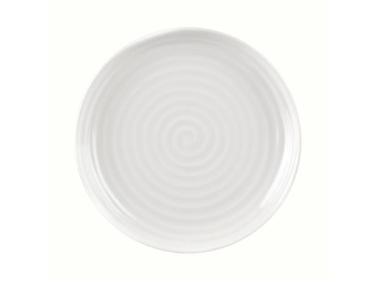 a white porcelain coupe plate with a ripple texture