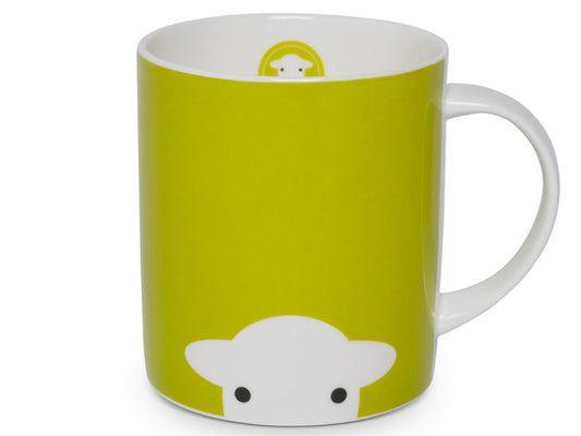 A fine bone china mug in solid grass green, there is a white cut out silhouette of a herdy sheep, replicated on the front and back of the mug.
