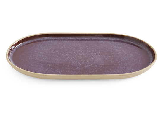 Portmeirion Minerals Large Oval Platter - Sustainable stoneware with raised edges, a reactive glaze in deep purple. Made from recycled clay with a textured exterior in a cream colour.