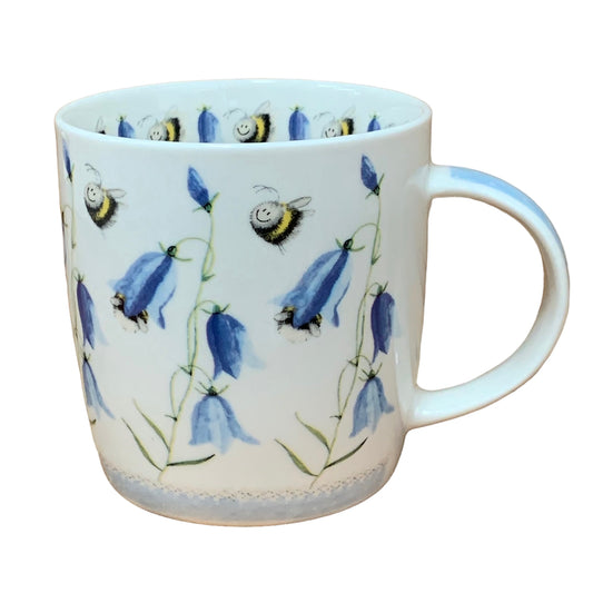 This Alex Clark mug is illustrated with lovely bumble bees hoovering over harebell flowers.  This mug also features an illustration around the inside rim & illustrations down the handle. 