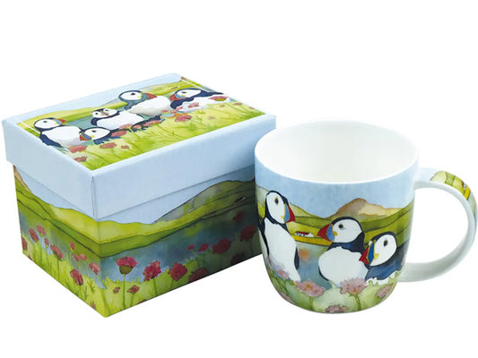 Created by Emma as a part of her Puffins Collection, these exceptional Fine Bone China mugs are elegantly encased in a striking gift box, rendering them an impeccable choice for gifting to a special recipient. Dishwasher & Microwave Safe Capacity of 350ml Height 8.5 cm Diameter 9 cm