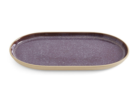 Portmeirion Minerals Medium Oval Platter - Sustainable stoneware with raised edges, a reactive glaze in deep purple. Made from recycled clay with a textured exterior in a cream colour.
