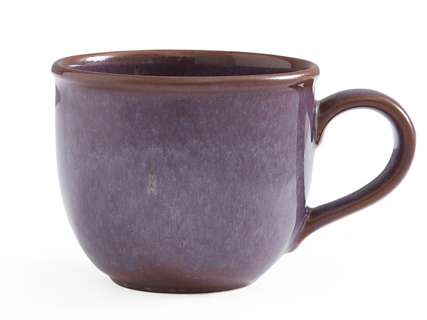 Stoneware mug with deep purple reactive glaze, resembling natural amethyst hues. Rounded lip for comfortable sipping, with glaze extending inside and out.
