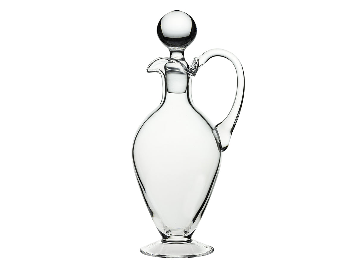 A handled wine decanter with a curved body and a round stopper.