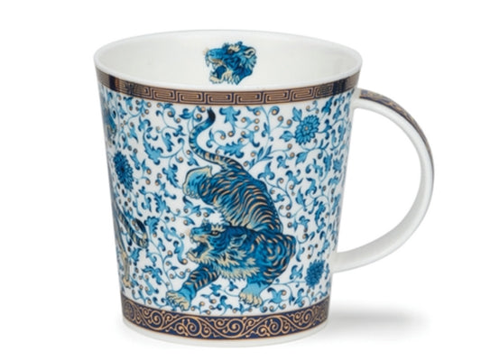 A large fine bone china mug decorated in blue and gold with a folage and tiger illustration