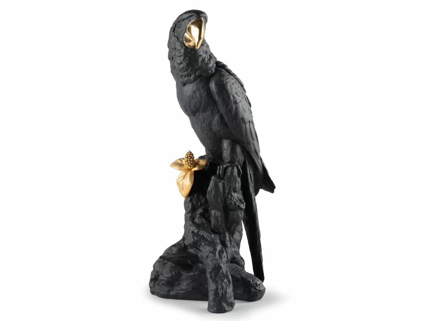 A macaw perched on a branch with a flower coming out of it. The whole piece is in a matte black finish, except the flower and macaw's beak, which are a metallic gold.