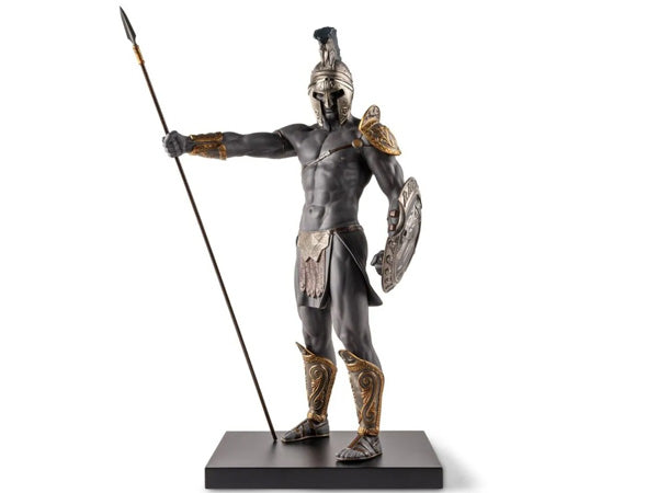black/brown porcelain figurine pays tribute to the legendary courage & sacrifice of King Leonidas & the three hundred Spartan Hoplites who valiantly defended the Thermopylae pass against the Persian army. It portrays one of these brave warriors equipped with a spectacular helmet adorned with plumes, a detachable mask that reveals the warrior's face through a magnet system