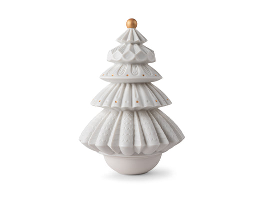 A white porcelain stylised Christmas tree with gold details and a domed base