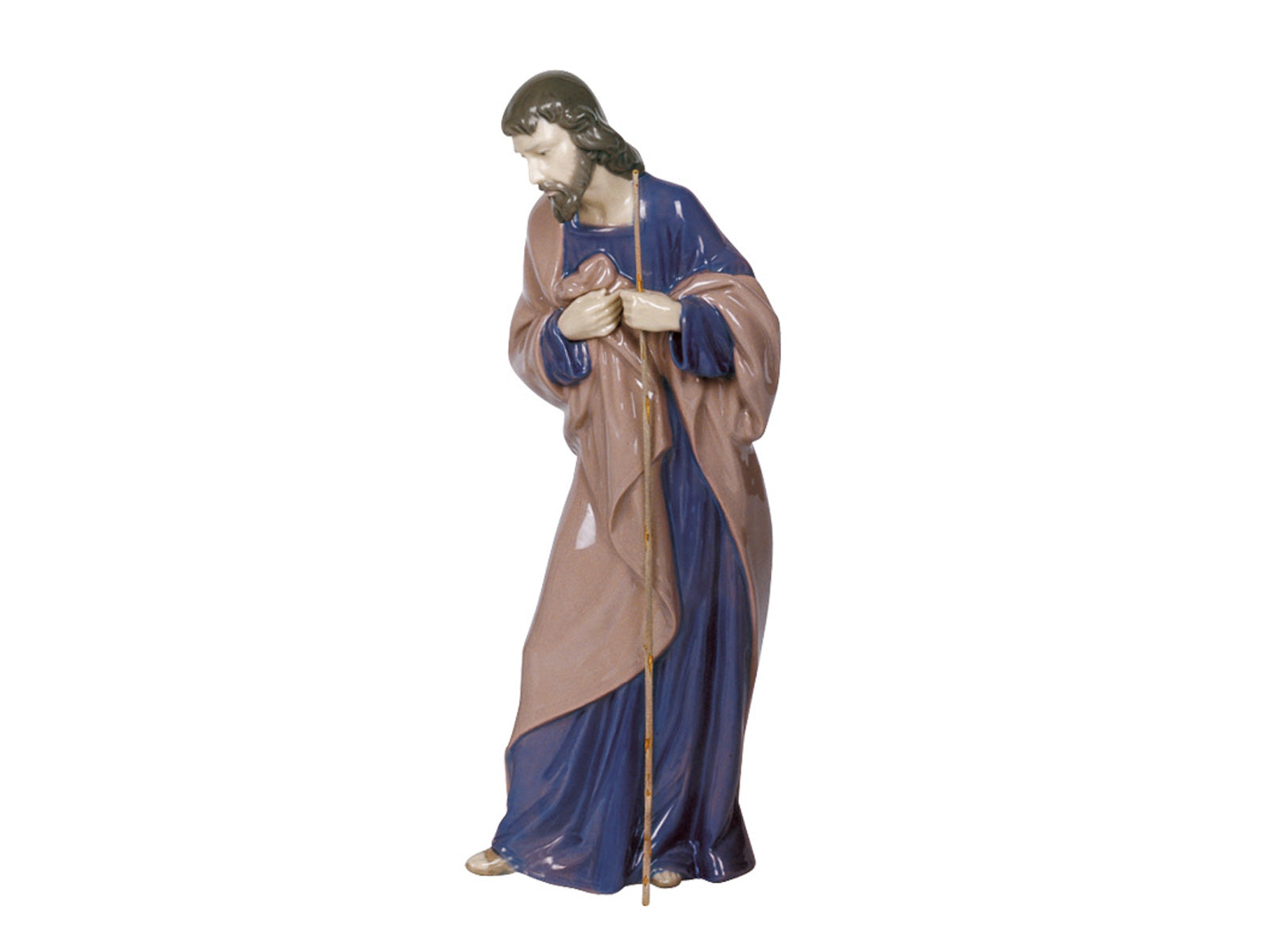 A beautiful porcelain sculpture of Saint Joseph, wearing a brown coat and holding a staff, this Nao figurine would be a beautiful addition to any Nativity set this Christmas.