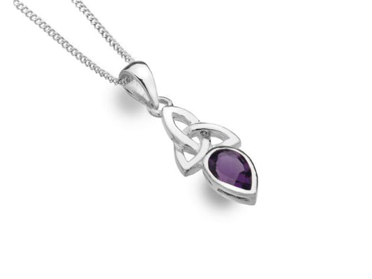 A silver necklace with a knotted pendant with a purple teardrop gemstone in it