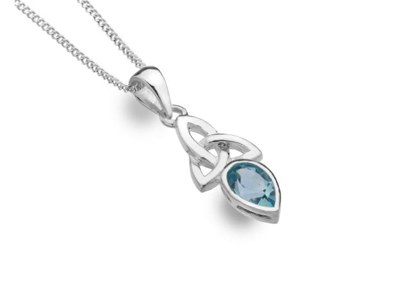 A silver necklace with a knotted pendant with a light blue stone in it