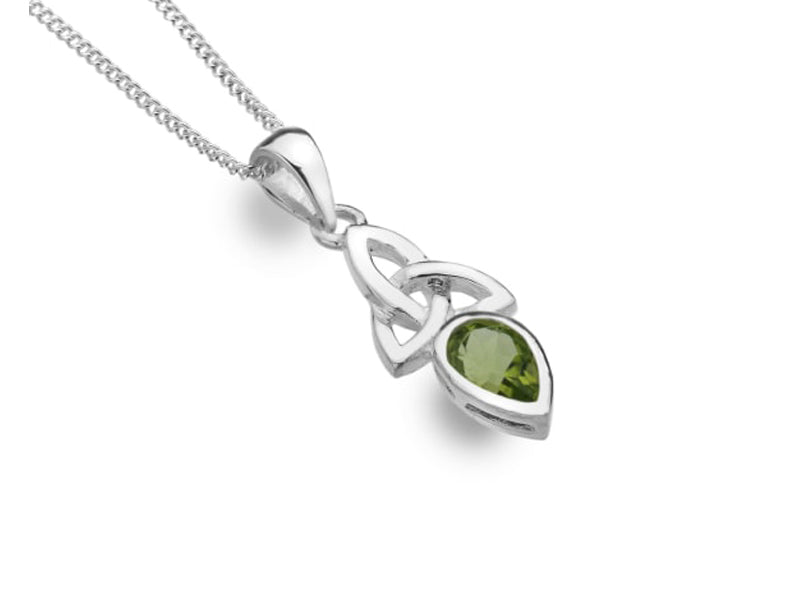 A silver necklace with a celtic knot and green pendant