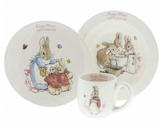 This delightful baby's dinnerware set is an ideal choice for serving an infant's meals. It includes a bowl, plate, and mug, all adorned with beloved characters from Beatrix Potter's world, including Flopsy, Mopsy, & Cottontail. This charming collection makes for a perfect 1st birthday gift for your precious little one.