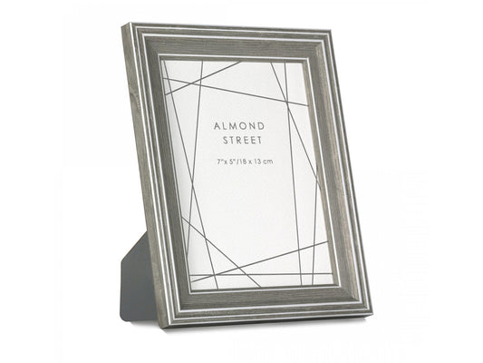 A dark grey and white moulded photo frame