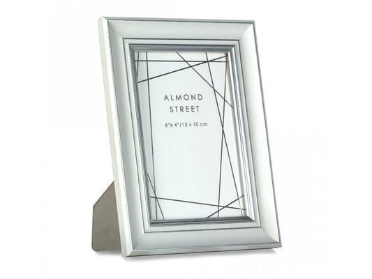 A white and silver photo frame