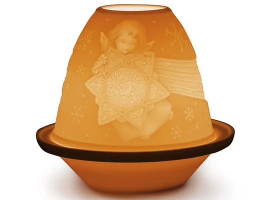 This amazing porcelain Lithophane Votive Light is depicting a delicately engraved figue of An Angel with a Star which is beautifully shown when lit. This piece is just one of the beautiful lithophanes we offer in our lithophane collection.