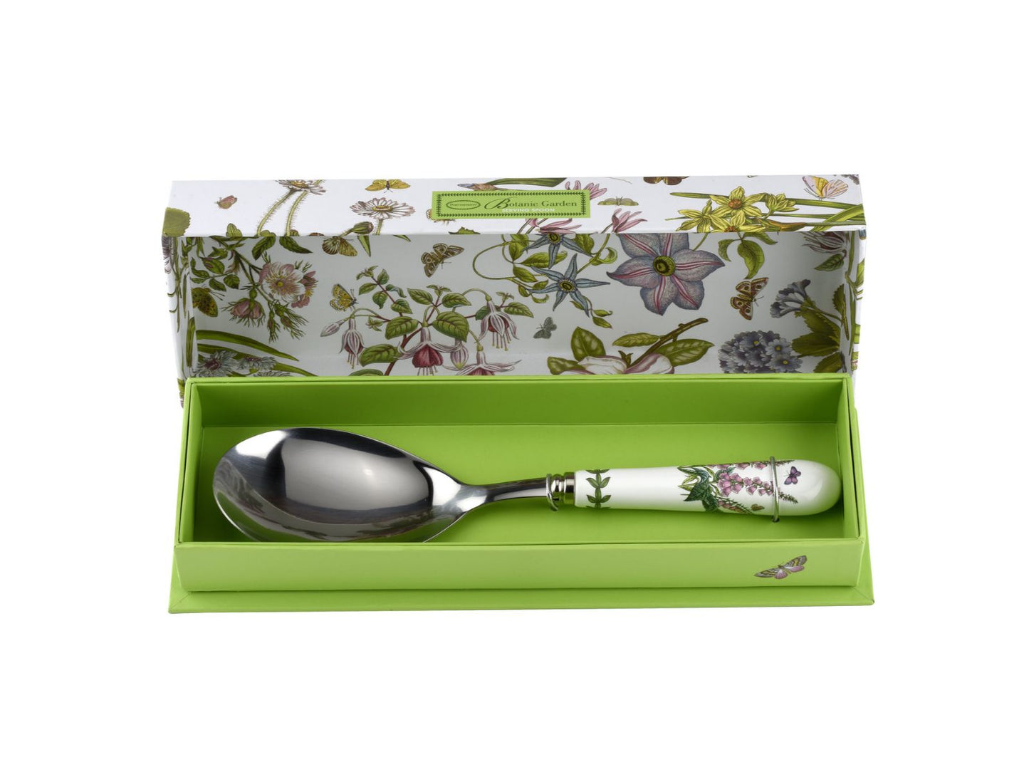 A boxed serving spoon with a porcelain handle, featuring a foxglove design and a laurel wreath around the join