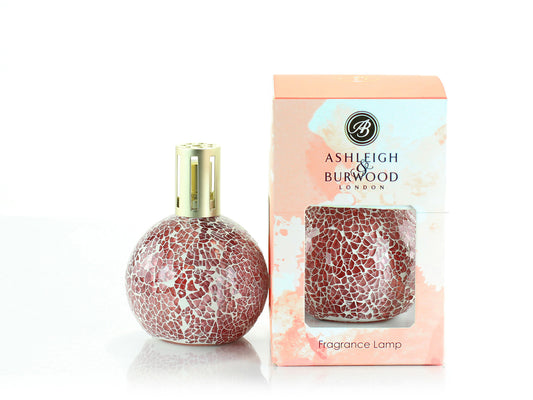 A coral mosaic fragrance lamp with a gold top, packaged in a coral and white watercolour box with Ashleigh and Burwood branding