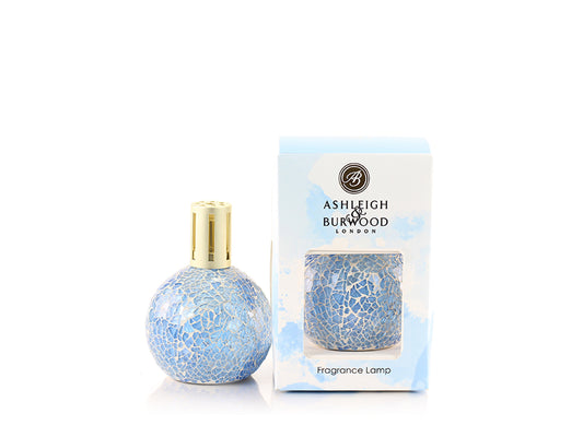 A blue mosaic glass fragrance lamp with a gold top and its packaging