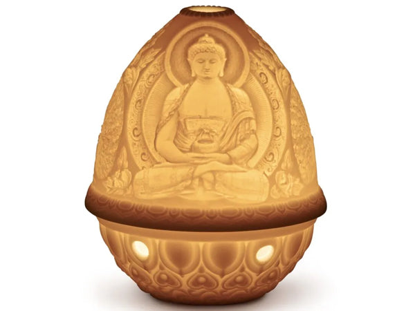 This amazing porcelain Lithophane Votive Light is delicately engraved with a seated Buddha in mid prayer, which is finely depicted when lit. This piece is just one of the beautiful lithophanes we offer in our lithophane collection.