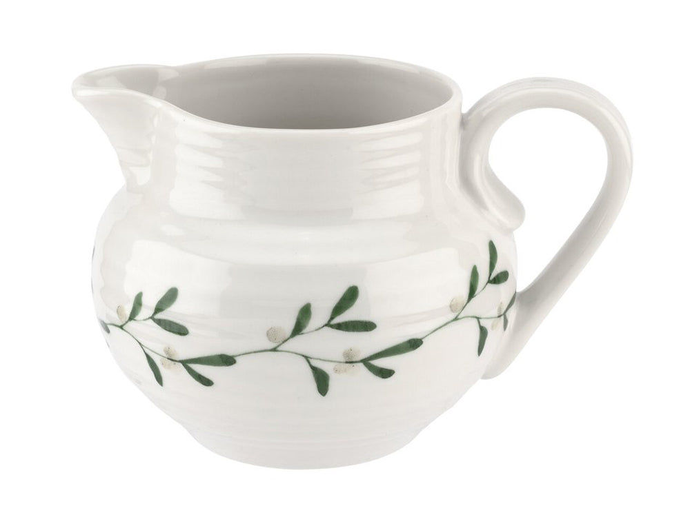 A small creamer jug that has been designed with Sophie Conran's signature rippling texture, with a chain of mistletoe printed around the white porcelain exterior. It is ideal for holding double cream for your Christmas pudding or milk for morning tea and coffees.
