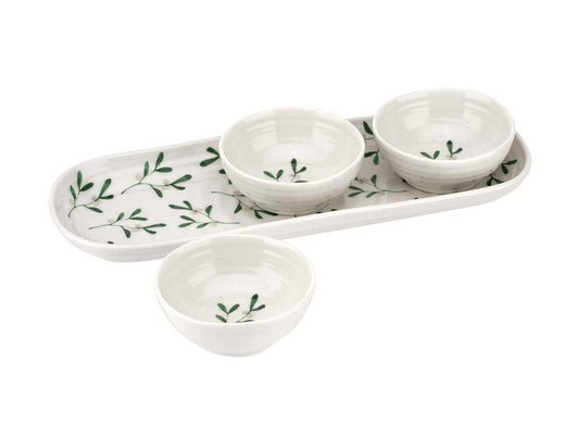 A white porcelain tray that has been printed with a mistletoe pattern and has a textured ripple effect in its design, along with three small dipping bowls that mimic the same design and have an individual mistletoe branch printed at the base of each bowl. Part of Sophie Conran's Mistletoe collection, and ideal for serving sauces for your Christmas dinner.