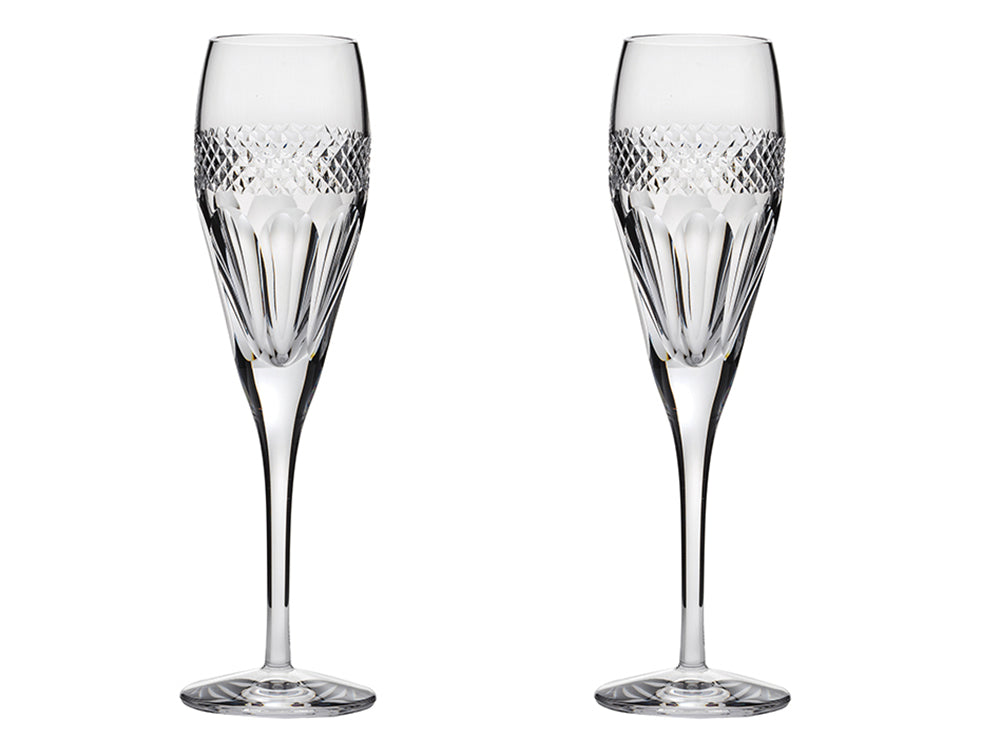 Pair of Royal Scot Crystal Diamonds Champagne Flutes, cut with a series of vertical panels around the base of the flute and a ring of diamonds around the centre