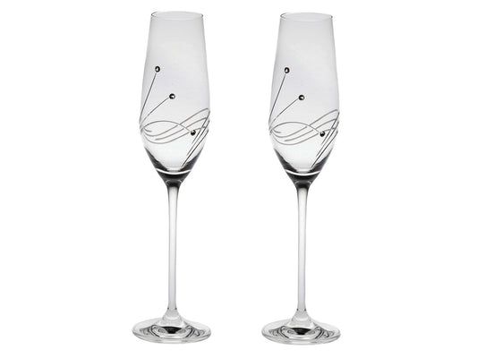 Pair of Royal Scot Crystal Diamante Champagne Flutes are hand-crafted in Britain from the finest crystal. Long and thin-stemmed, the main body of the glass is engraved with a triple swirling pattern that are each tipped with Swarovski crystals to add a delicate touch.