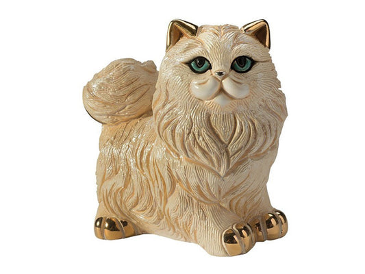 A porcelain figurine depicting an angora cat breed with white fur & blue eyes. The figurine is finished in a pearlescent enamel coating and golden accents on the cats ears, nose and paws. 