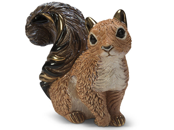 Handcrafted De Rosa red squirrel porcelain figurine with textured copper-toned fur, bushy metallic bronze tail, cream chest, and glossy black eyes, sitting upright against a white background.