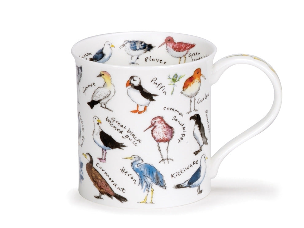 A fine bone china mug with straight sides and a subtly fluted top. It features illustrations of common coastal birds, including puffins, sandpipers, oyster catchers, gulls, and more! The mug's handle is adorned with a stem of green foliage and yellow blooms. Inside the rim, you'll find a collection of additional bird illustrations, such as a plover, sanderling, curlew, greenshank, common gull, and green sandpiper.