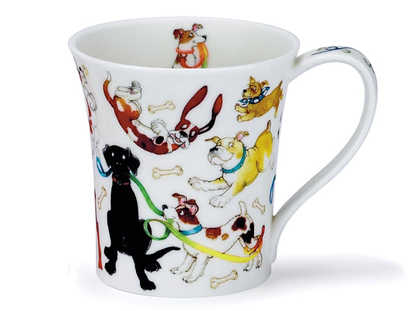 A small, white, fine bone china mug adorned with colourful illustrations of playful dog breeds chasing bones and frolicking around. The mug has a fluted top and its inner rim showcases a black Scottish Terrier with a tartan cape and a brown and white Jack Russell holding a multi-coloured lead.