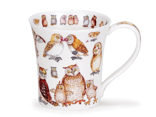 A white fine-bone china mug by Dunoon in the small Jura size. This mug is adorned with comically posed illustrations of owls and playful owlets engaged in activities such as eating worms and playing. The top of the mug is elegantly fluted, and its inner rim features a charming circle of illustrated owlets.