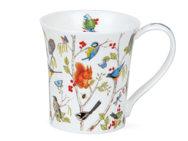 A small fine bone china mug with a wrap design of woodland animals perched on/in between branches, including blue tits, squirrels, owls and more.