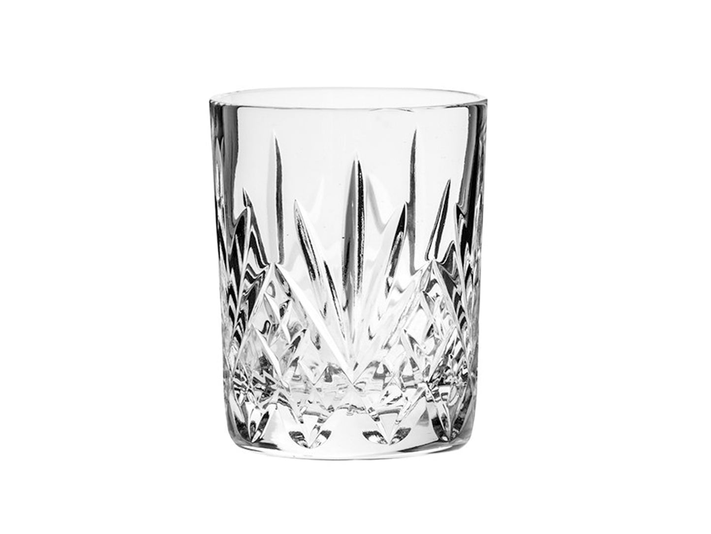 A small crystal whisky tumbler with a tive-pointed fan cut into the outside on a bed of diamonds