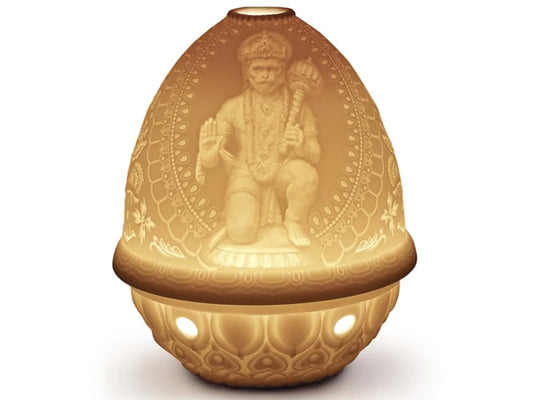 This amazing porcelain Lithophane Votive depicts Hanuman, the heroic monkey God of Hinduism. The engraved details are wonderfully defined when lit. This piece is just one of the beautiful lithophanes we offer in our lithophane collection.