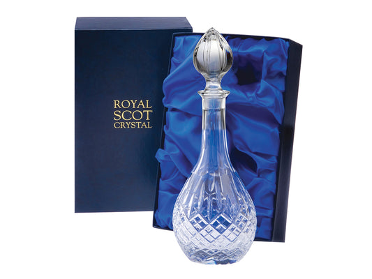 A sleek wine decanter with a long neck and a pointed stopper, engraved with the london cut from Royal Scot that features a bed of diamonds at the base and single flicks reaching up towards the neck.