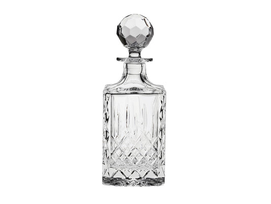 A square spirit decanter with a gold-ball style topper. The decanter is engraved with the London cut from Royal Scot, which has a bed of diamonds at the base and single dashes shooting up towards the top from each point of the diamonds below.