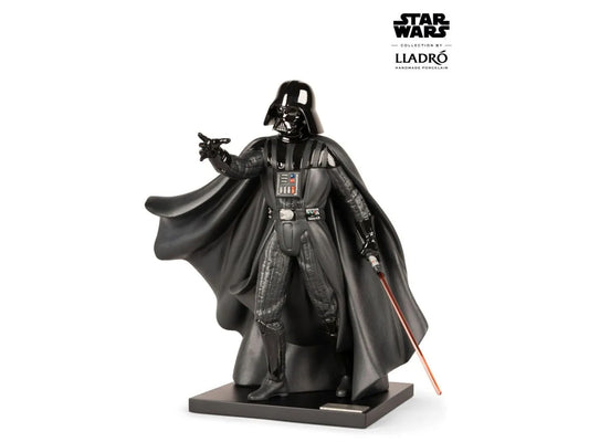 A matte and glazed black porcelain sculpture of Darth Vader in a cloak and battle armour