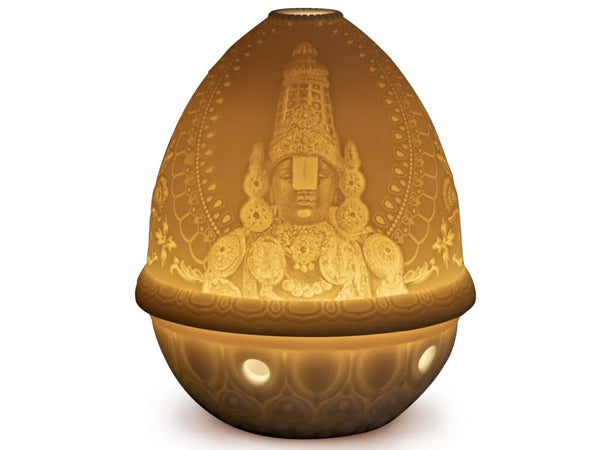 A stunning Lladro Lithophane make with translucent white porcelain which allows the light to shine through. The artisan will then carve a scene that will shine brighter. A beautiful and warming lamp that will add atmosphere to the room. This lithophane features Lord Balaji who is a form of the Hindu God Vishnu.