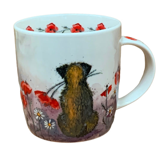 Alex Clark mug is illustrated with a lovely Border Terrier dog admiring the view & holding a Poppy in his mouth