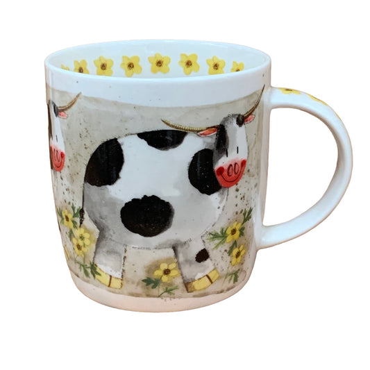 This Alex Clark mug is illustrated with a cow called Dorothy who is standing in her meadow of flowers
