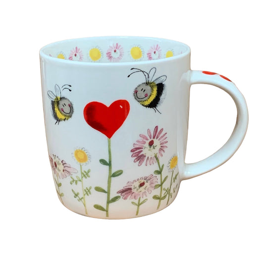 This Alex Clark mug is illustrated with two lovely bees hoovering over a heart flower.  This mug also features a flower illustration around the inside rim & illustrations down the handle.  