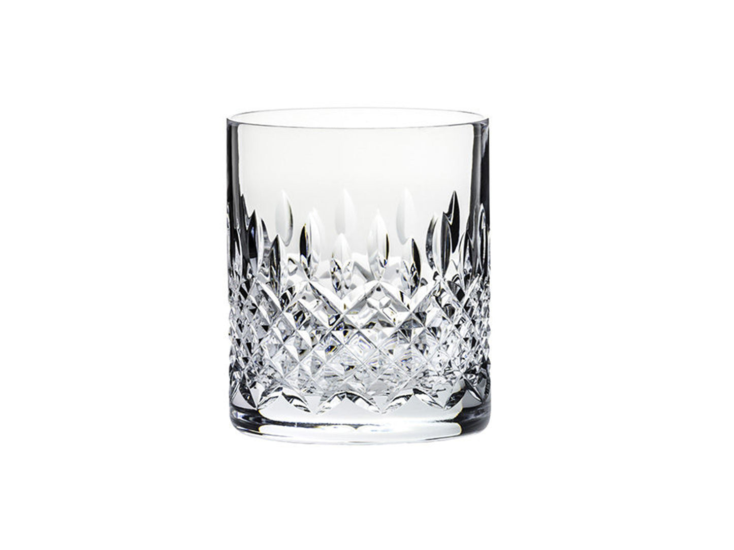 A crystal whisky glass with an intricate bed of diamonds cut around the base with dashes going up towards the smooth rim