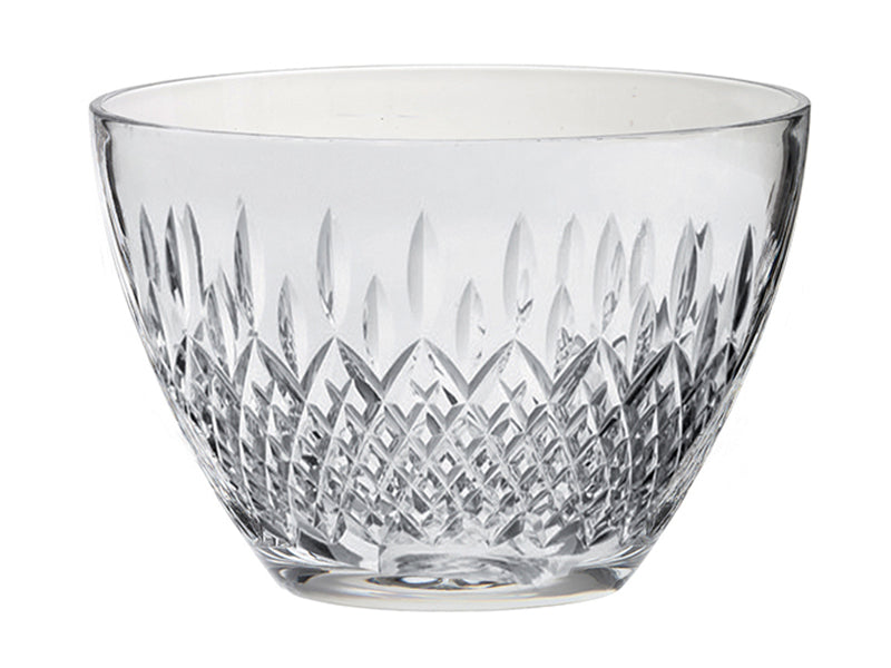 A deep crystal bowl with a cut pattern on the outside