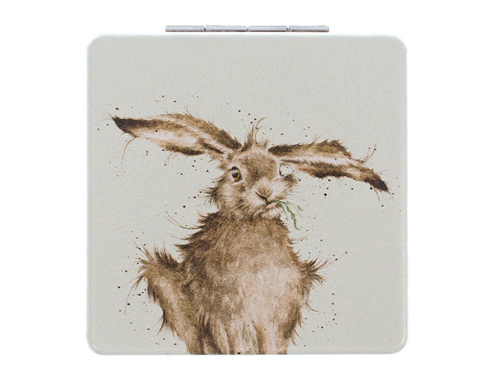 A light green square pocket mirror with a brown hare on the front