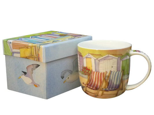 The "Beach Hut" Bone China Mug, a creation by Emma Ball, is elegantly accompanied by a lovely presentation box, rendering it an excellent choice for gifting or as a delightful personal indulgence.  Dishwasher & Microwave Safe Capacity of 350ml Height 8.5 cm Diameter 9 cm